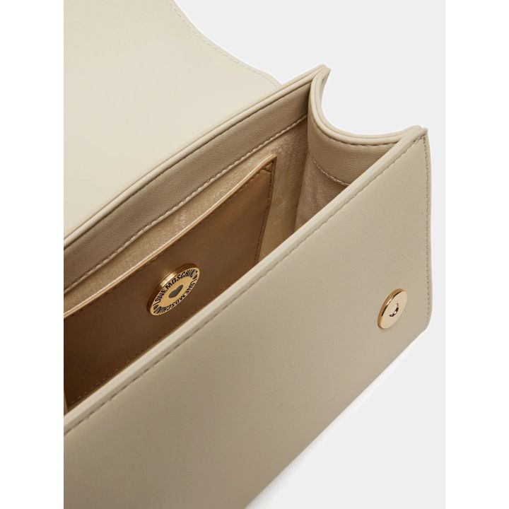 Interno della borsa avorio con chiusura magnetica e taschino