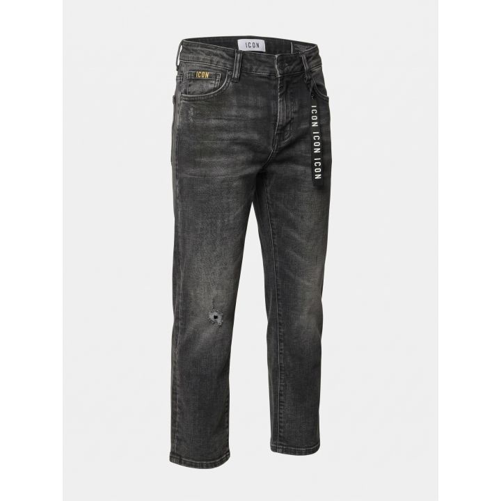 Jeans ICON neri vista di tre quarti con piccolo strappo sul ginocchio