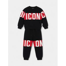 Tuta ICON nera da bambino vista frontale con fascia rossa logata