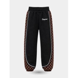 Pantaloni tuta Sprayground neri con bande a scacchi marroni, vista frontale