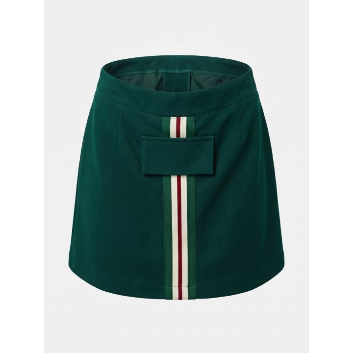 Gonna Gabriella Gucci verde da ragazza, vista frontale con banda a righe e pattina