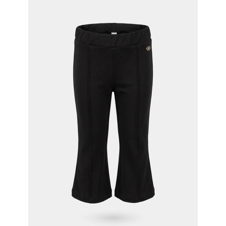 Pantaloni FUN&FUN neri a zampa da neonata, vista frontale con logo dorato