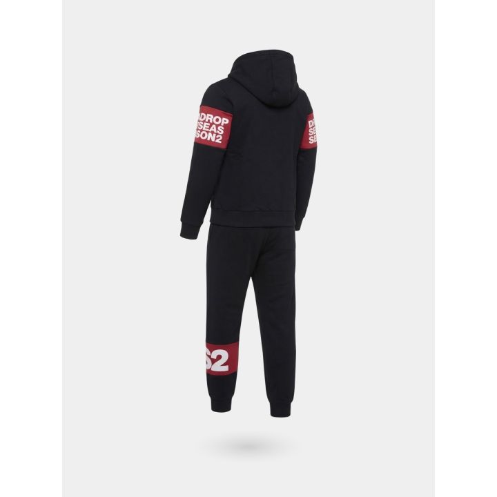 Tuta DS2 bambino nera con felpa zip e fascia rossa con logo, retro di tre quarti
