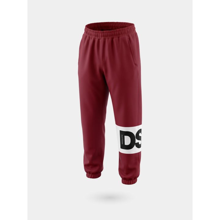 Pantalone tuta DS2 ragazzo bordeaux con fascia logo bianca, vista di tre quarti