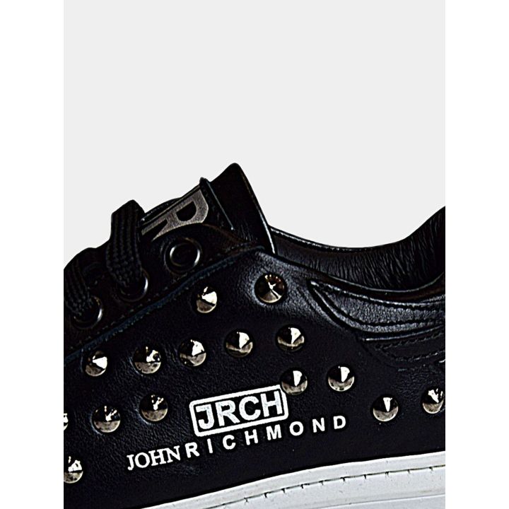 Dettaglio del logo JRCH e della scritta John Richmond sul fianco
